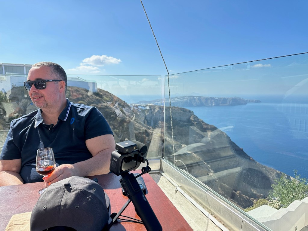 Kris at Santo Winery with caldera view stretching behind